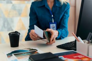 front-view-woman-working-as-travel-agent_23-2150433379