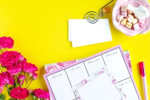 planning-important-things-pink-writing-instruments-colored-background-things-top-view-copy-space_127032-1751