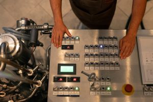 top-view-man-working-beer-factory_23-2150573900