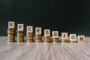 word-recession-decreasing-coins_181624-19378