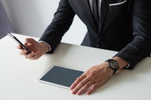 boss-studying-reports-gadgets-screen_1262-18148-1