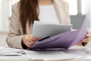 young-adult-organizing-documents_23-2149396653-3